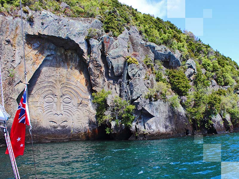 The iconic rock carvings at Mine Bay.